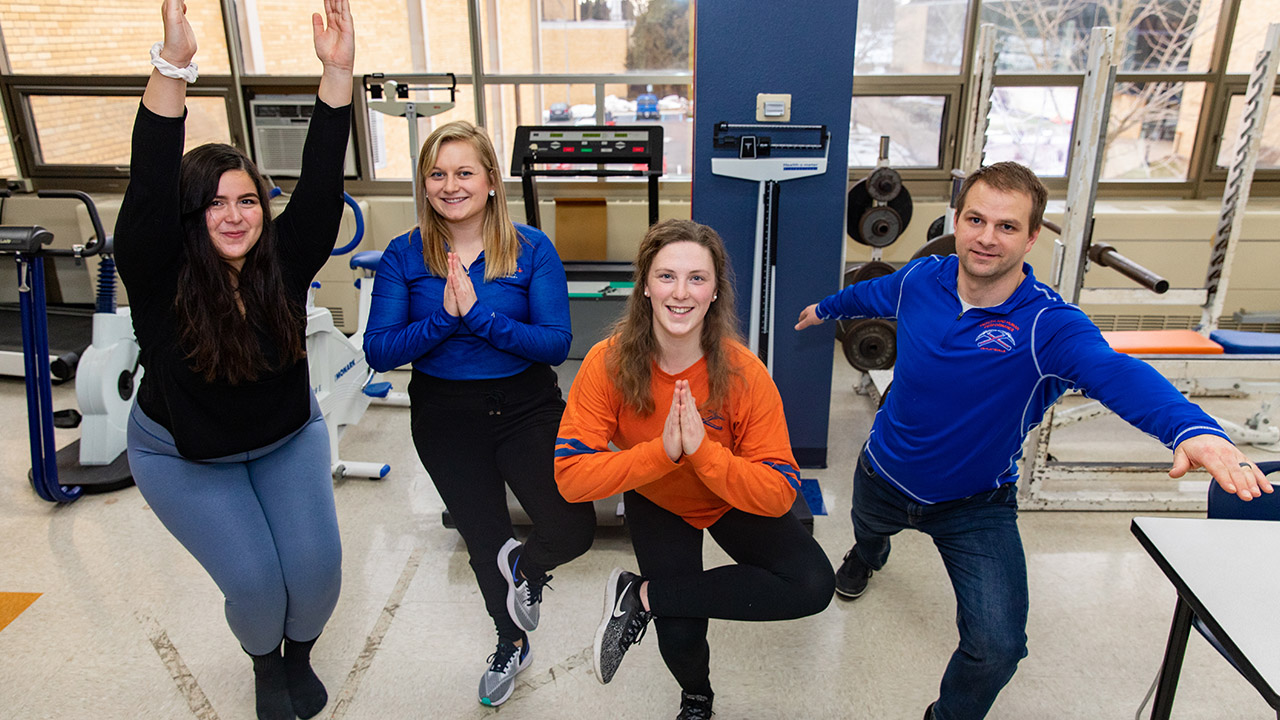 Monica Radtke, Brooke Kunkel, Ann Larson, and Professor Cowley reminisce about their yoga study.