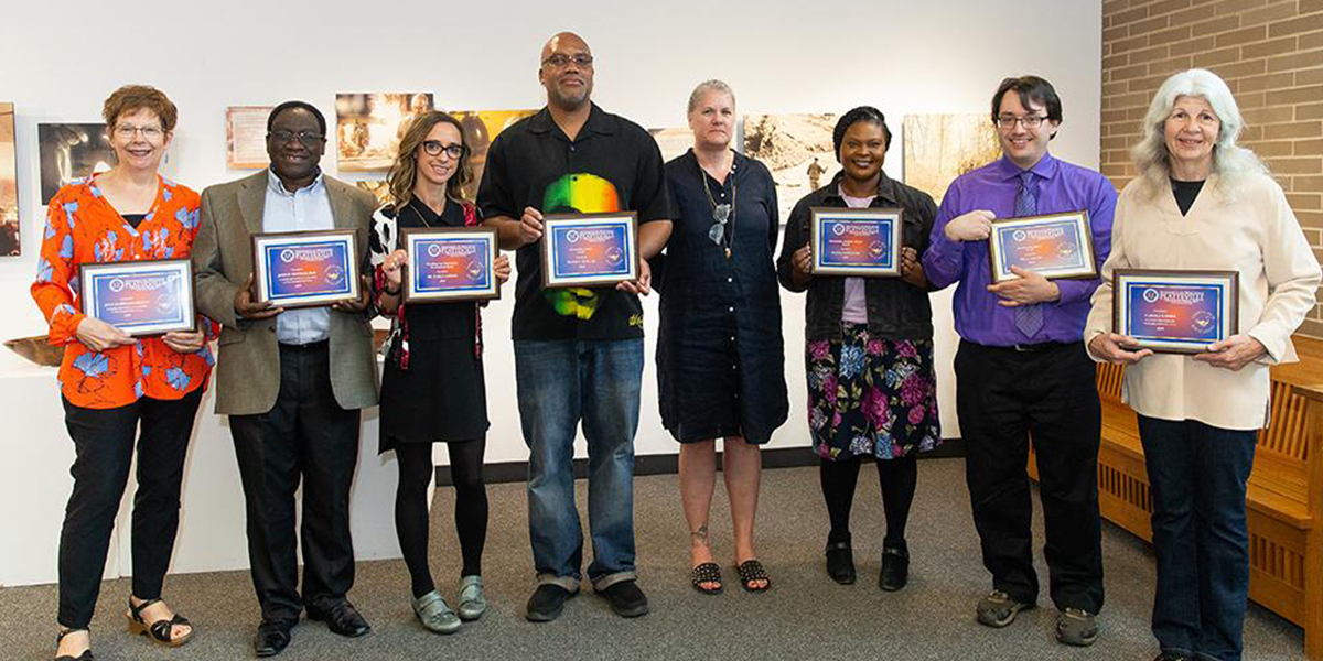 Left to right: Dr. Joan Riedle, Dr. John Nkemnji, Dr. Kara Candito, Dr. Frank King, Jr., Dr. Melissa Gormley, Dr. Shan Sappleton, Dr. Will LeSuer, and Carolyn Fries.