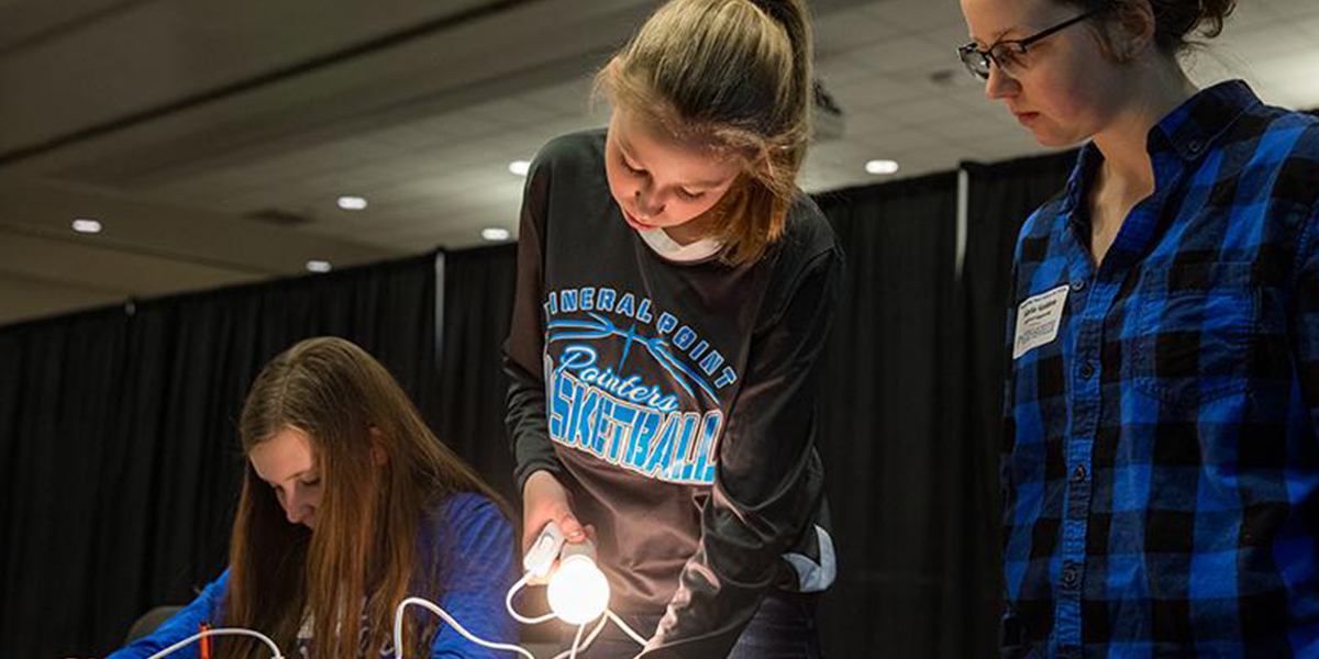 students doing an experiment in Pioneering Your Future in STEM