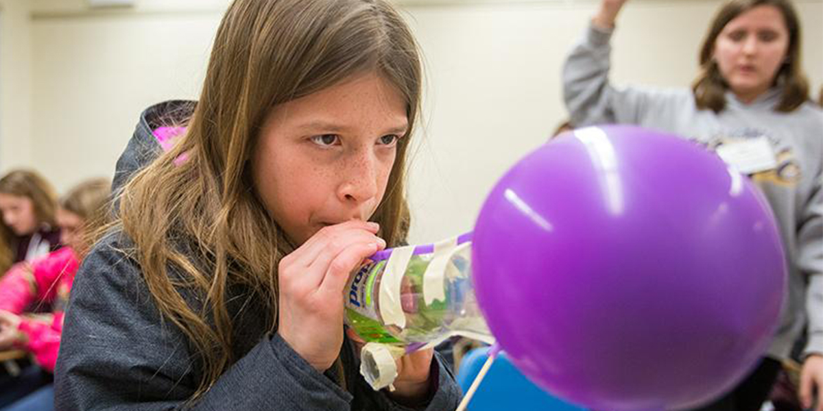 students doing an experiment in Pioneering Your Future in STEM