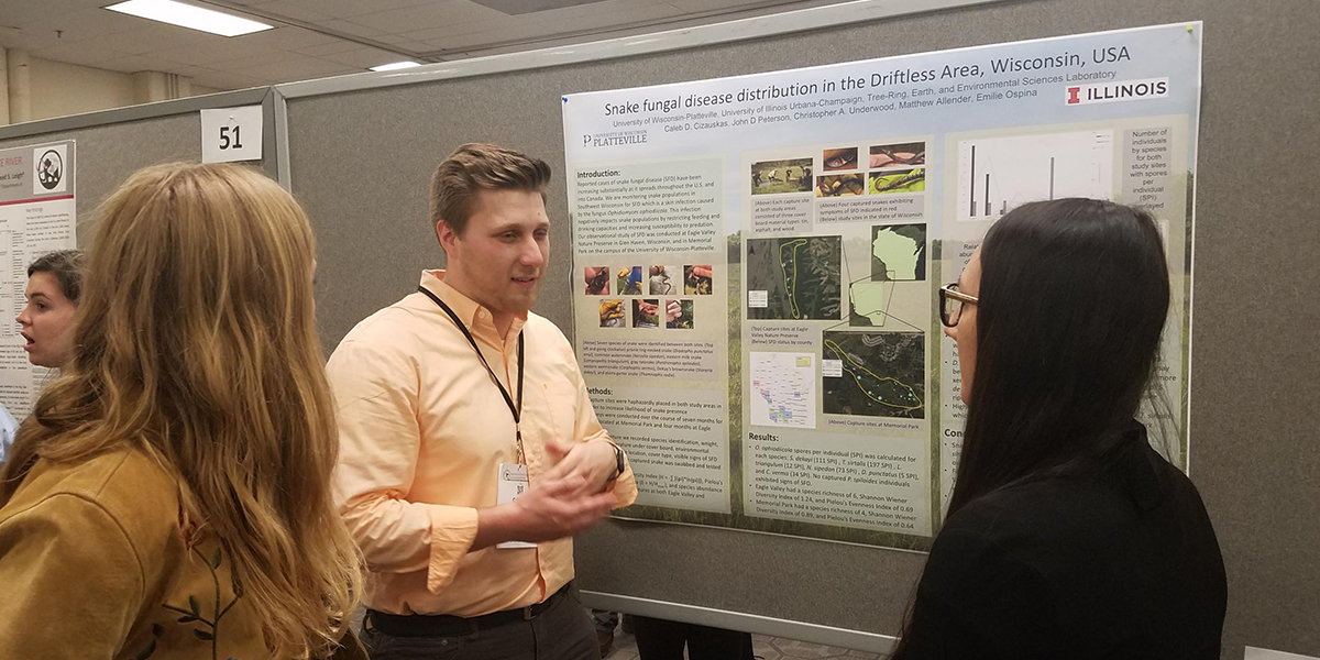 Student presenting at the geography conference