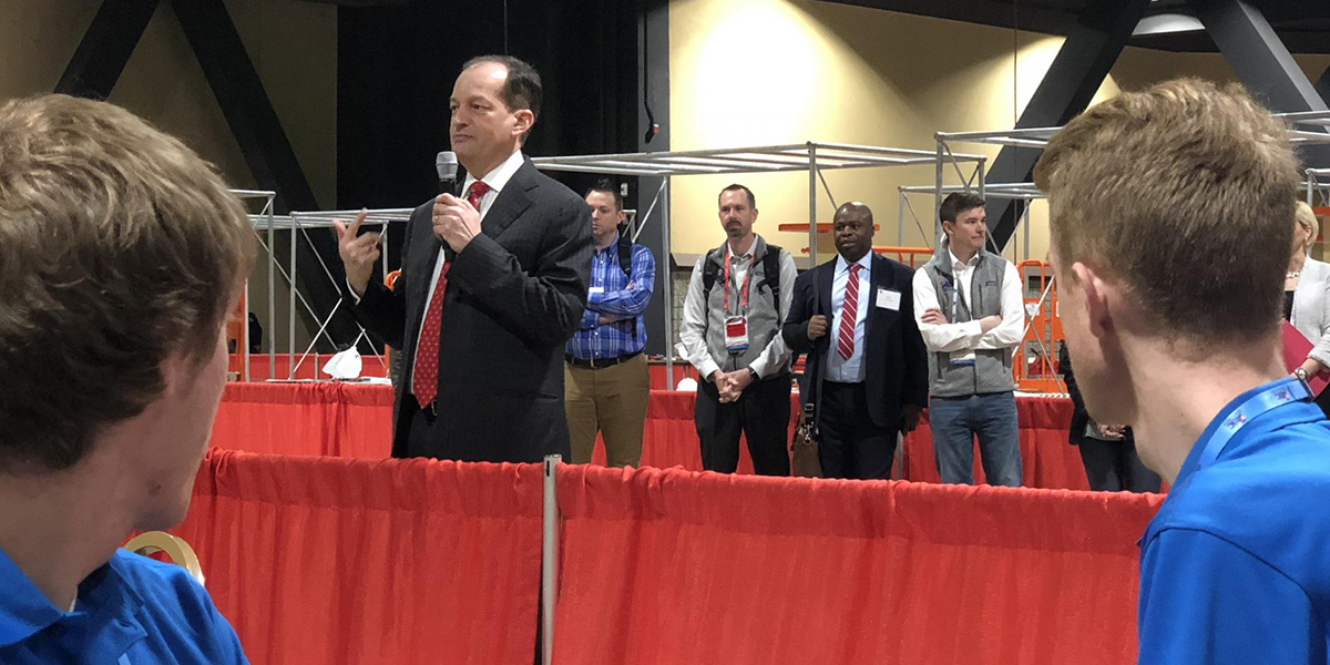 United States Labor Secretary Alexander Acosta addresses the competitors.