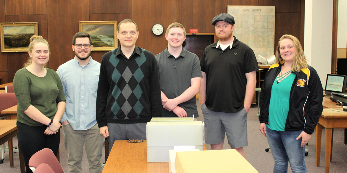 UW-Platteville Students and Dr. Andrey Ivanov inside the reading room of Wisconsin Historical Society