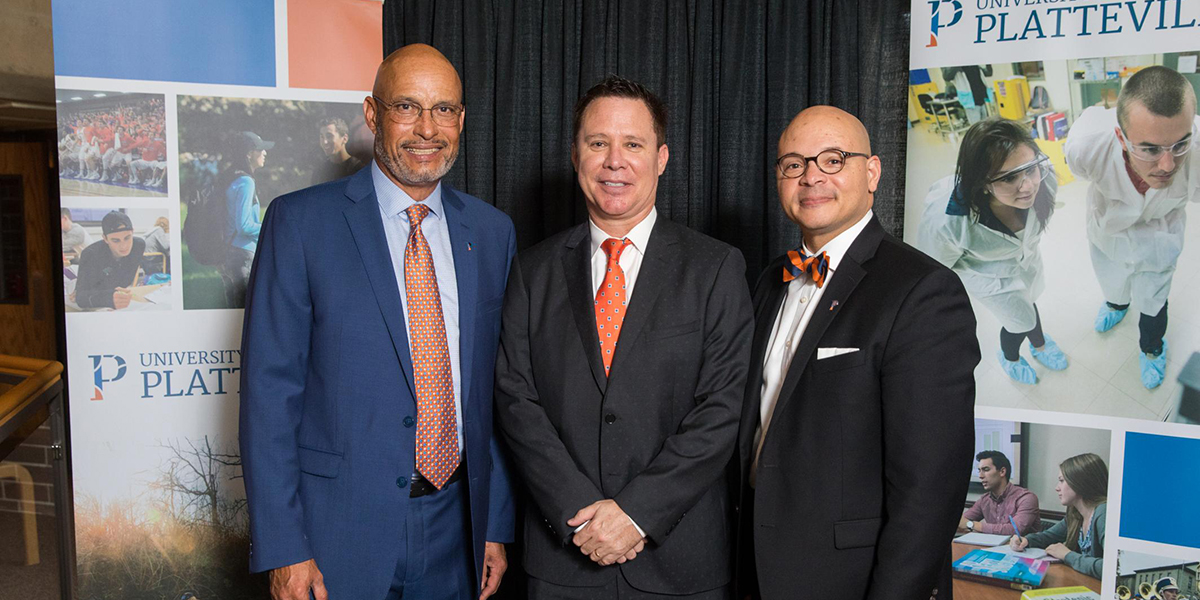 Dr. Michael O’Connor (middle), with Chancellor Dennis Shields (left) and Dr. Craig Wilson, Dean of the Division of Professional Studies and School of Graduate Studies, received an Outstanding Alumni award at the 2018 University Awards and Recognition Ceremony and Gala, which is held annually during the university’s Homecoming