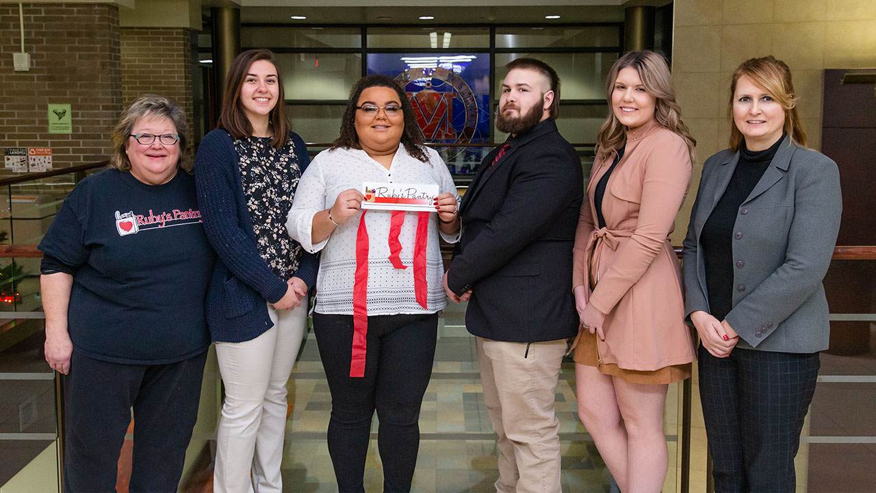 Pictured left to right are Deb Putnam, Murphy Bleymeyer, Raiven Breseman, Clay Spooner, Sydney Williams and Valerie Gill, MSW, LISW