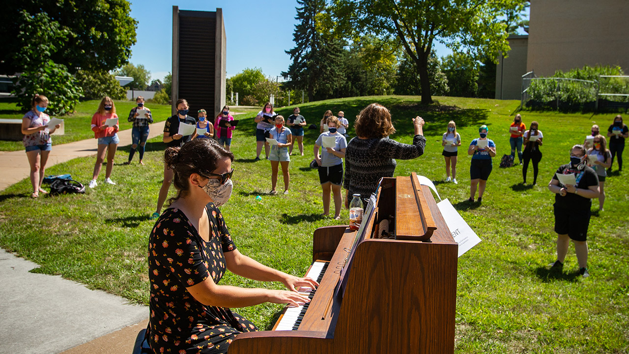 Choral practice is held outside of the Center for the Arts.