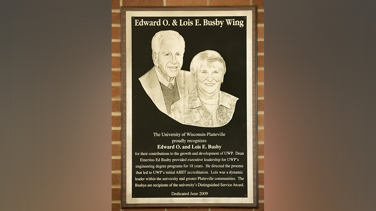 A plaque commemorating the Edward O. and Lois E. Busby Wing of Engineering Hall, dedicated in 2009.