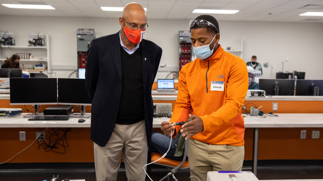 Drew Francis and Chancellor Dennis J. Shields