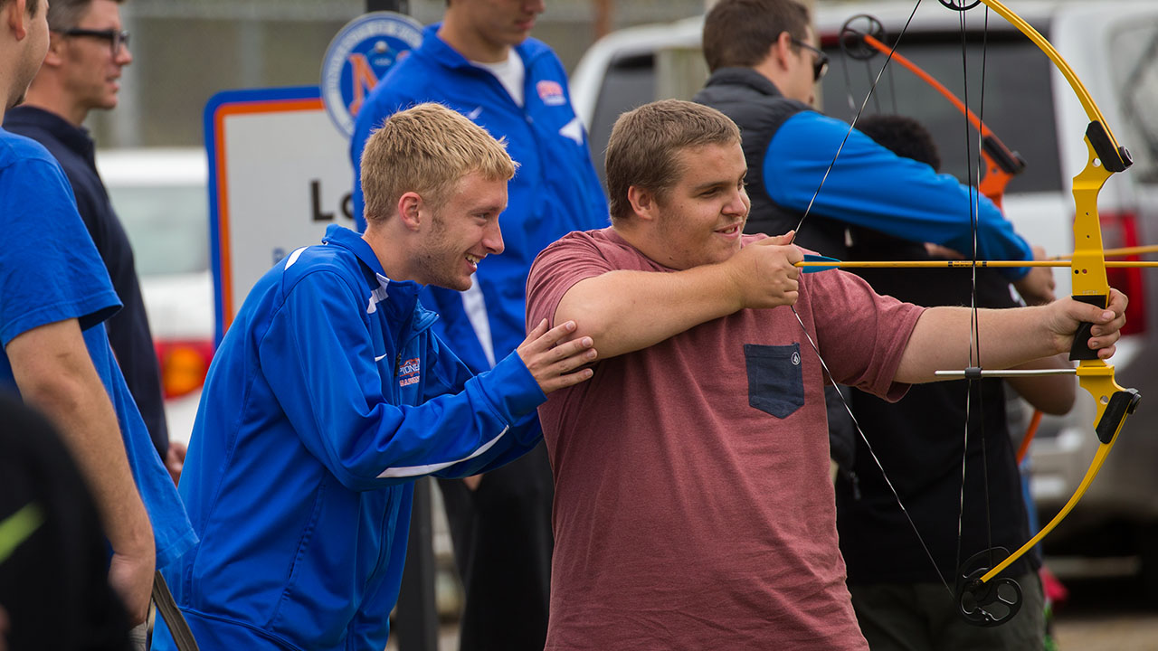 Jacob Horan participates in the Health and Human Performance program’s partnership with Wisconsin Center for Blind and Visually Impaired, to teach adapted physical education activities (2017). 