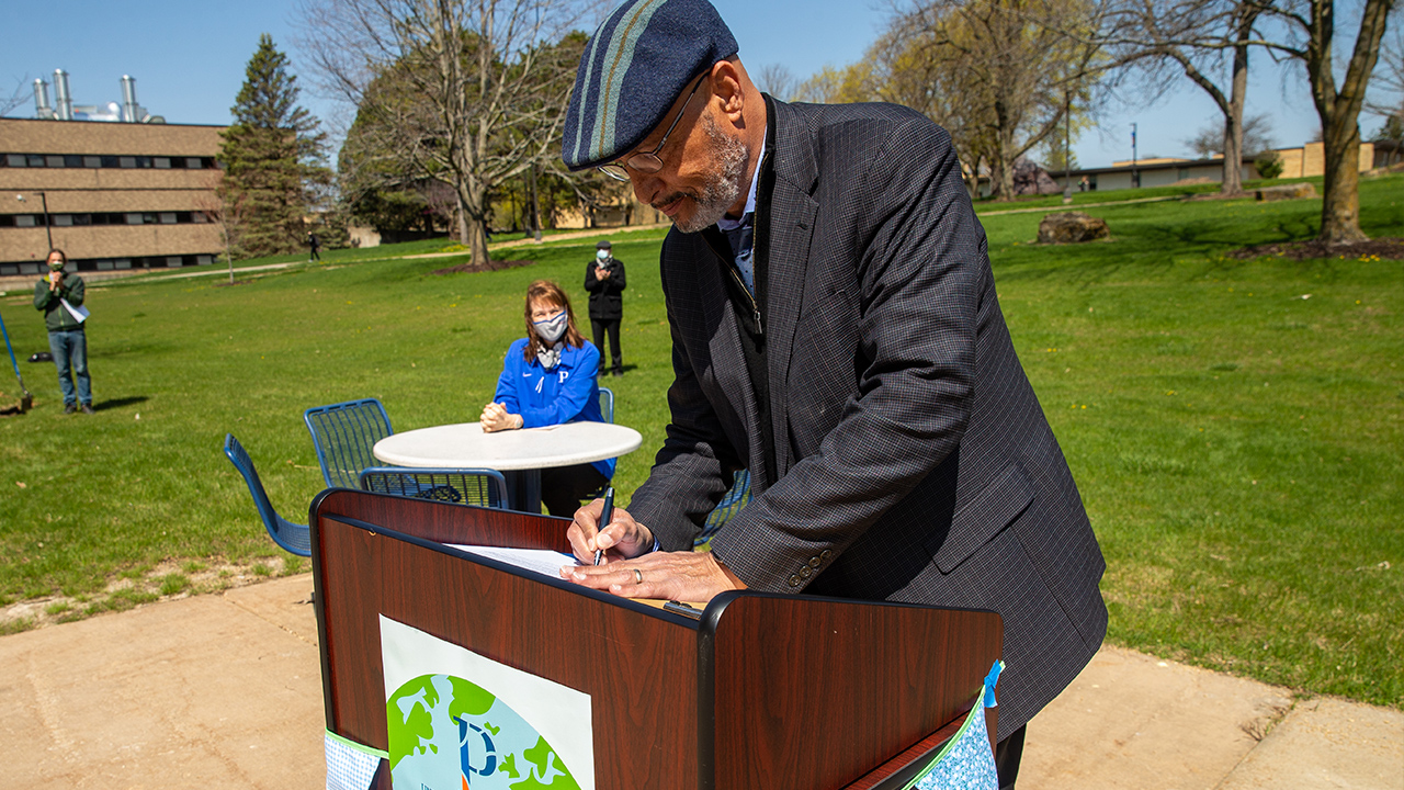 Chancellor Shields signing pledge