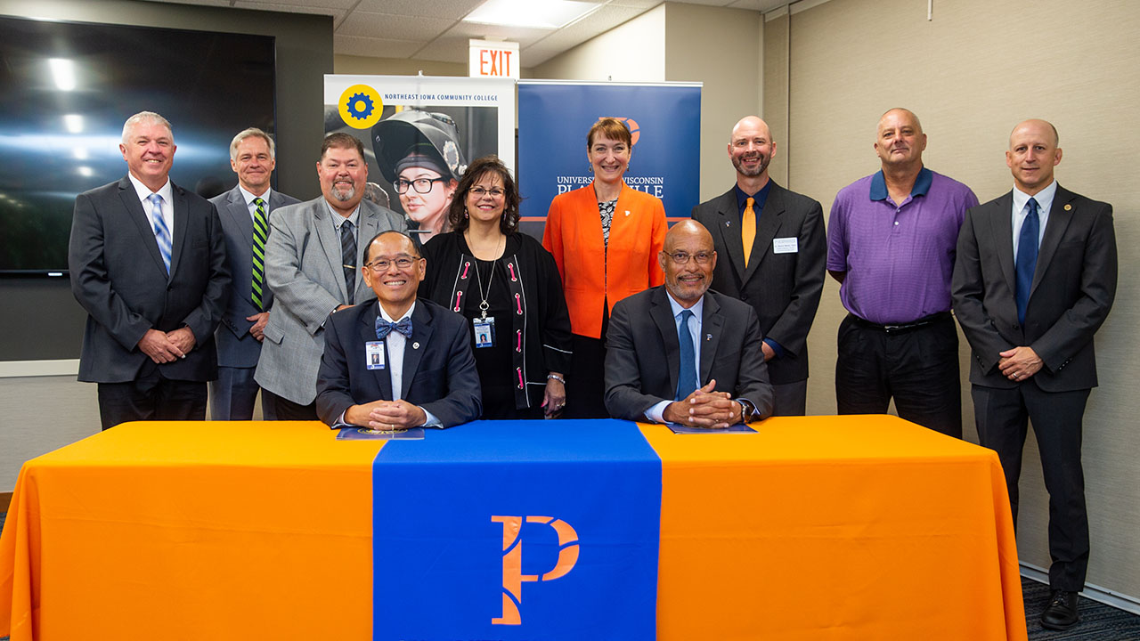 Group photo of NICC and UW-Platteville articulation agreement signing
