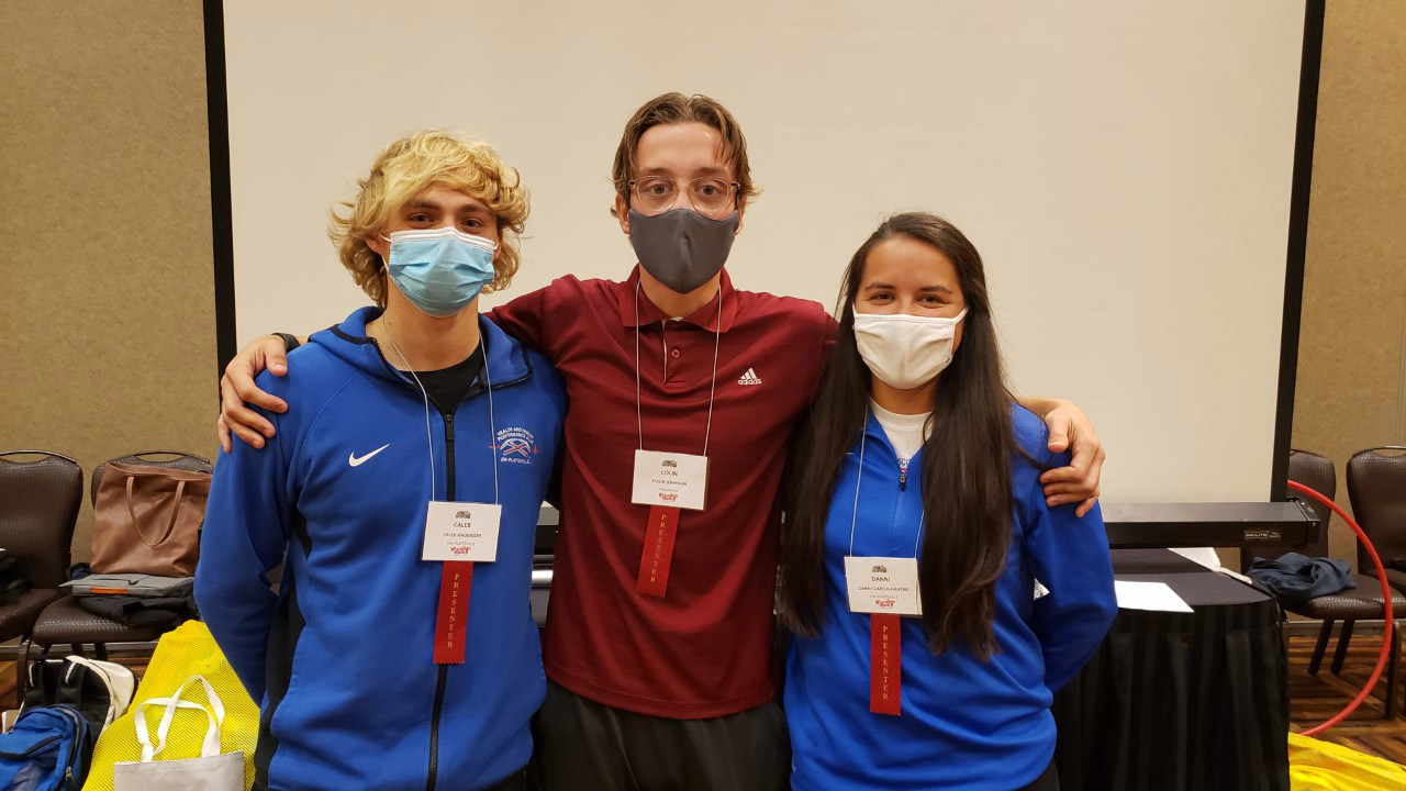 Pictured left to right are student presenters Caleb Anderson, Colin Johnson, and Danni Garcia-Havens