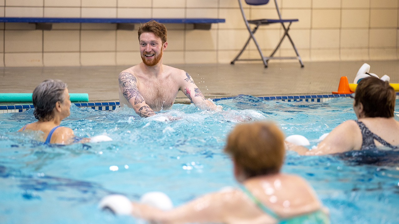 Baird Miller teaching water aerobics