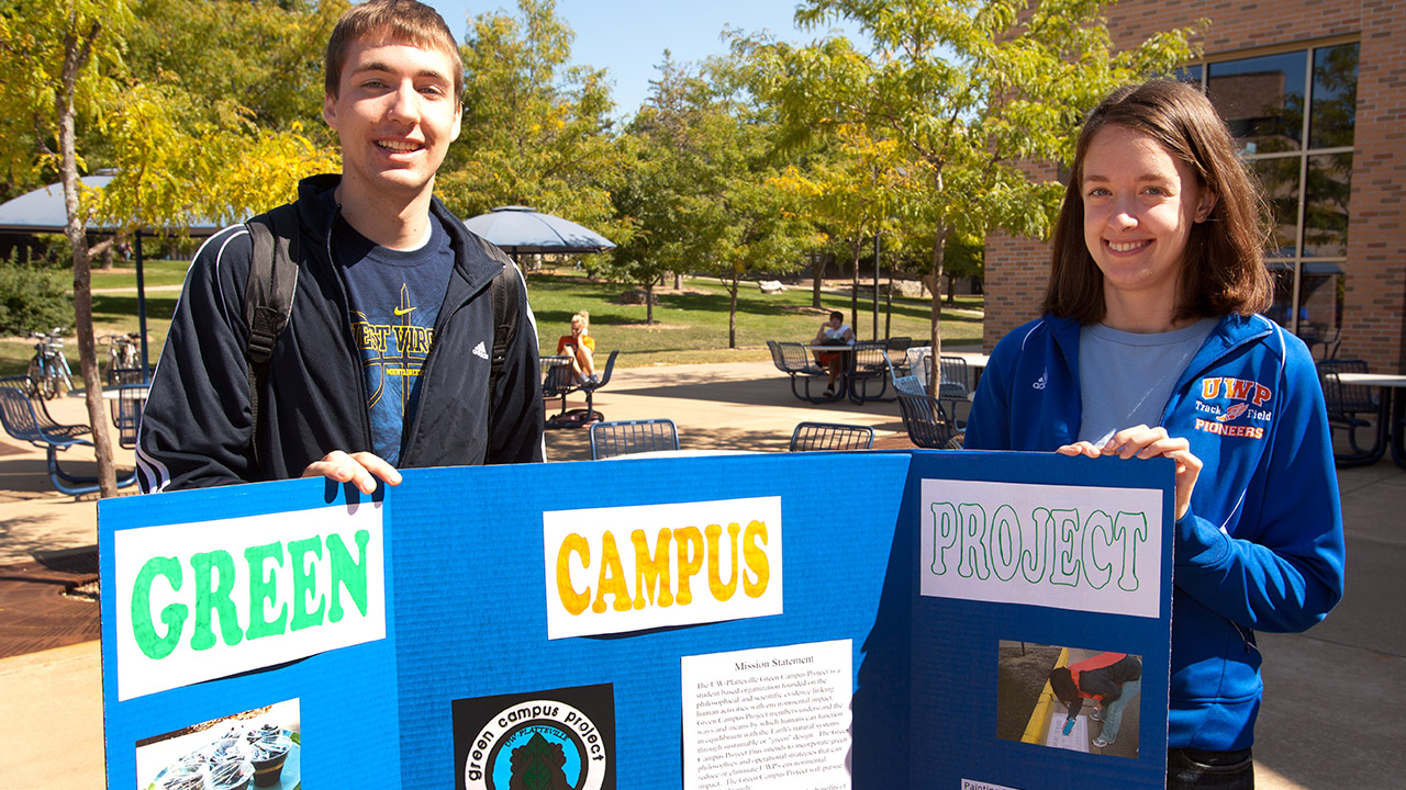 Students with Green campus project display