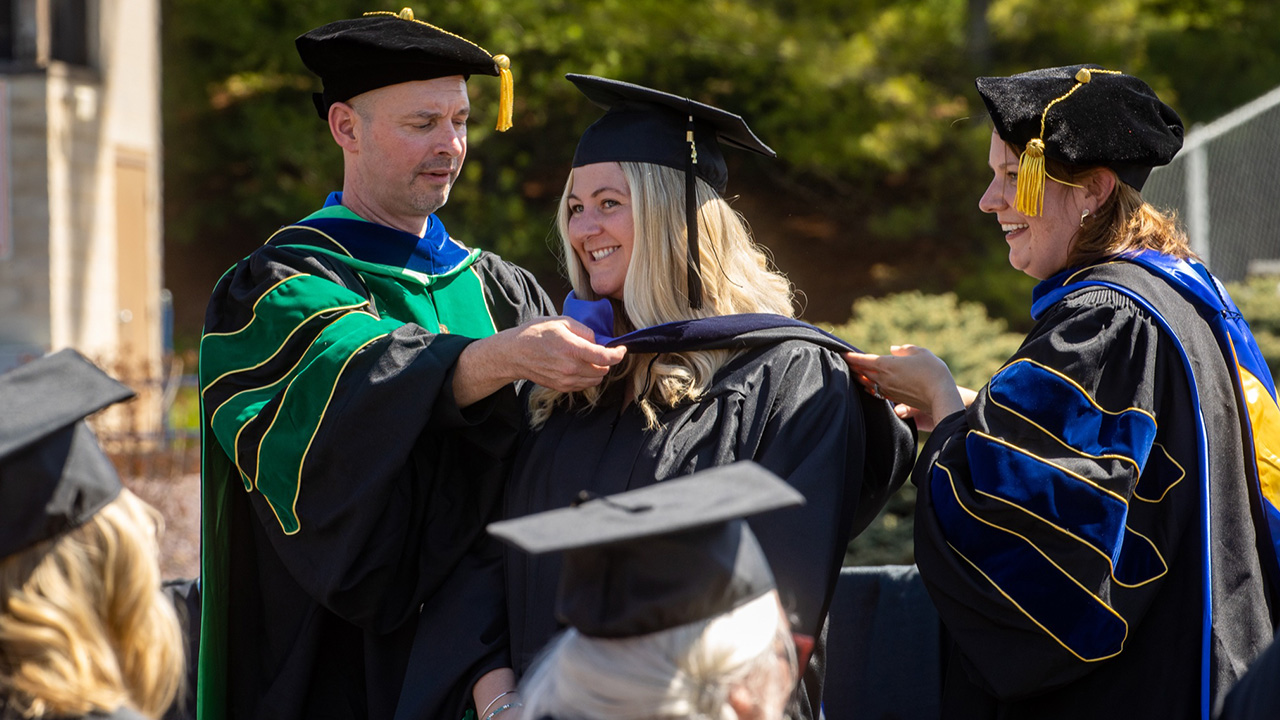Melissa Davis receives her Master of Science in Criminal Justice at the spring 2022 commencement ceremony.