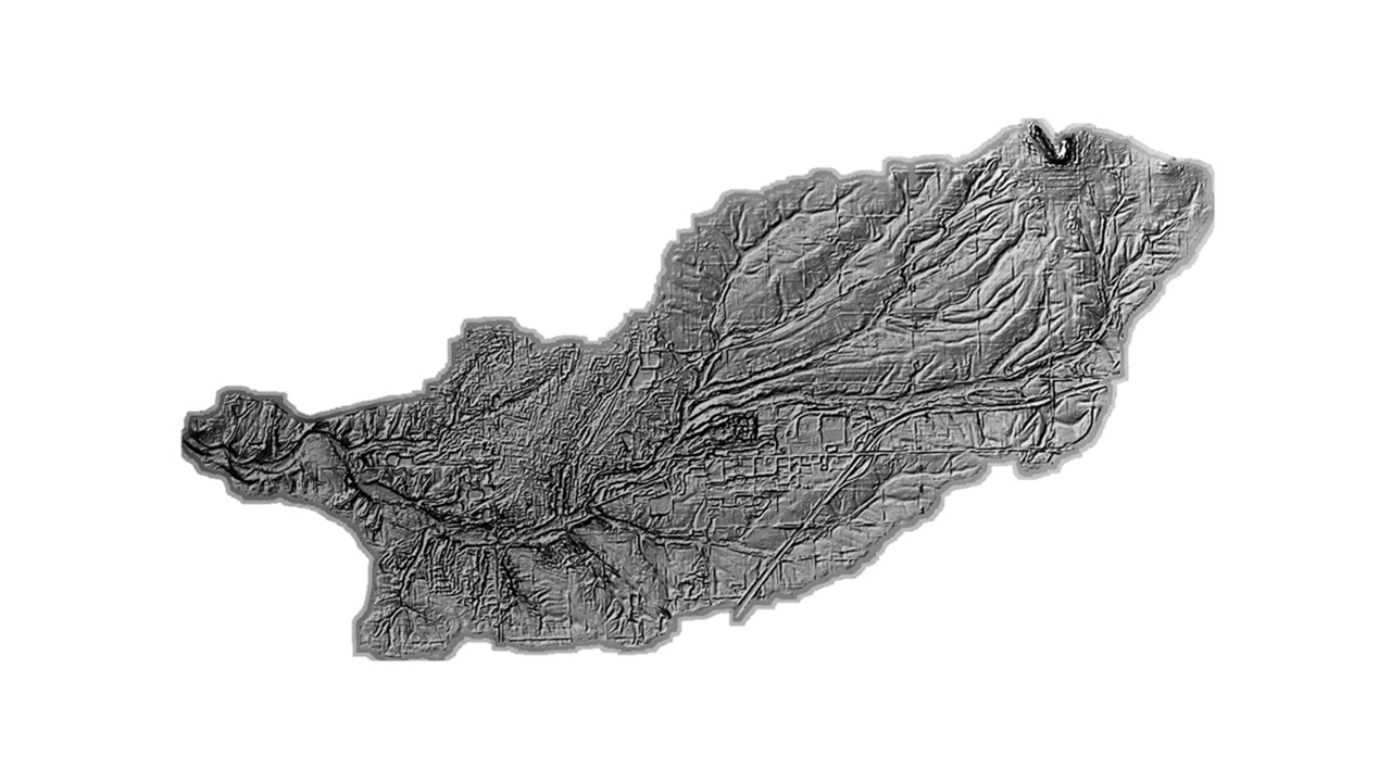 An illuminated hillshade of the Rountree Branch watershed, showing river valleys, plateaus and areas of abrupt change in elevation; created using blended layers of digital elevation. 