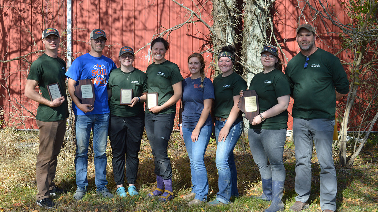 Pictured left to right are Ethan Neumann, Isaac Nollen, Nicole Plenty, Abby Field, Hope Saroka, Tresa Jo Koopmeiners, Brooklynn Hill and Dr. Chris Baxter.