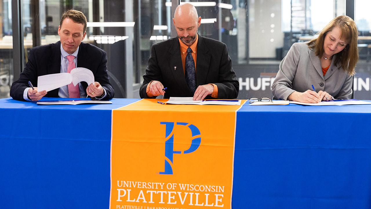 Signing ceremony with Madison College in Sesquicentennial Hall