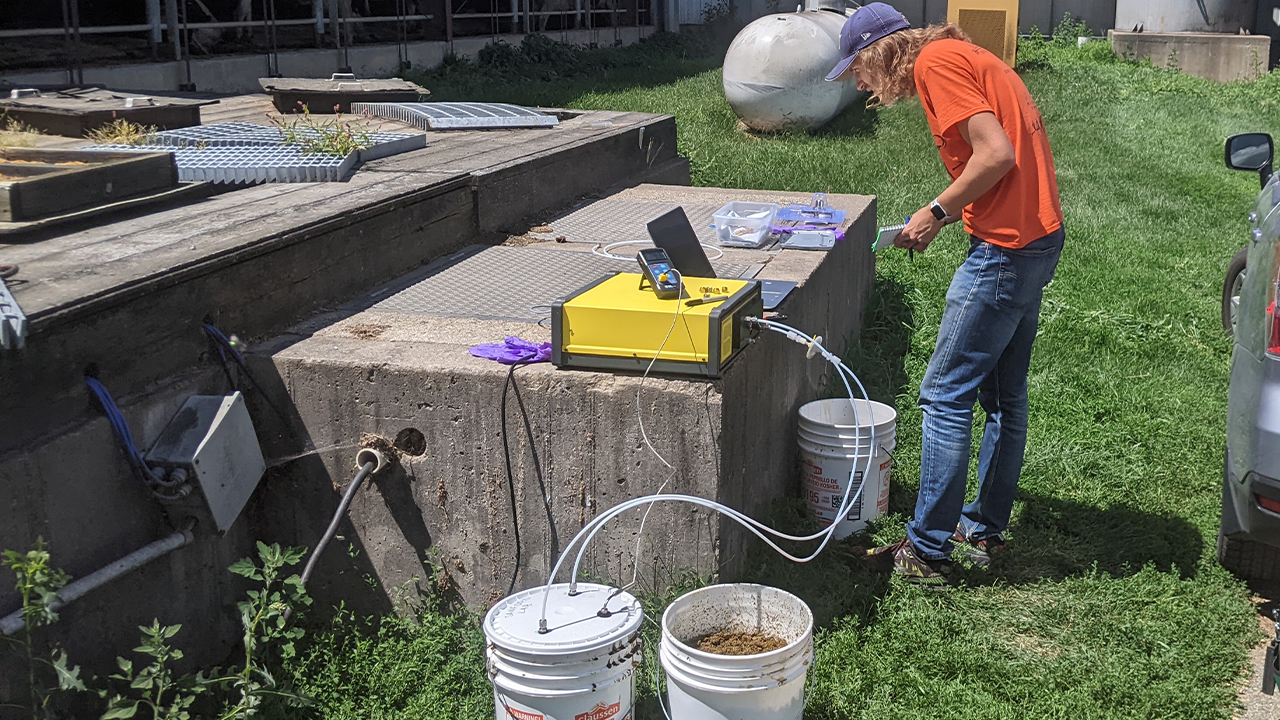 Zach Flitsch tests the analyzer and determines how to set up the experiment.