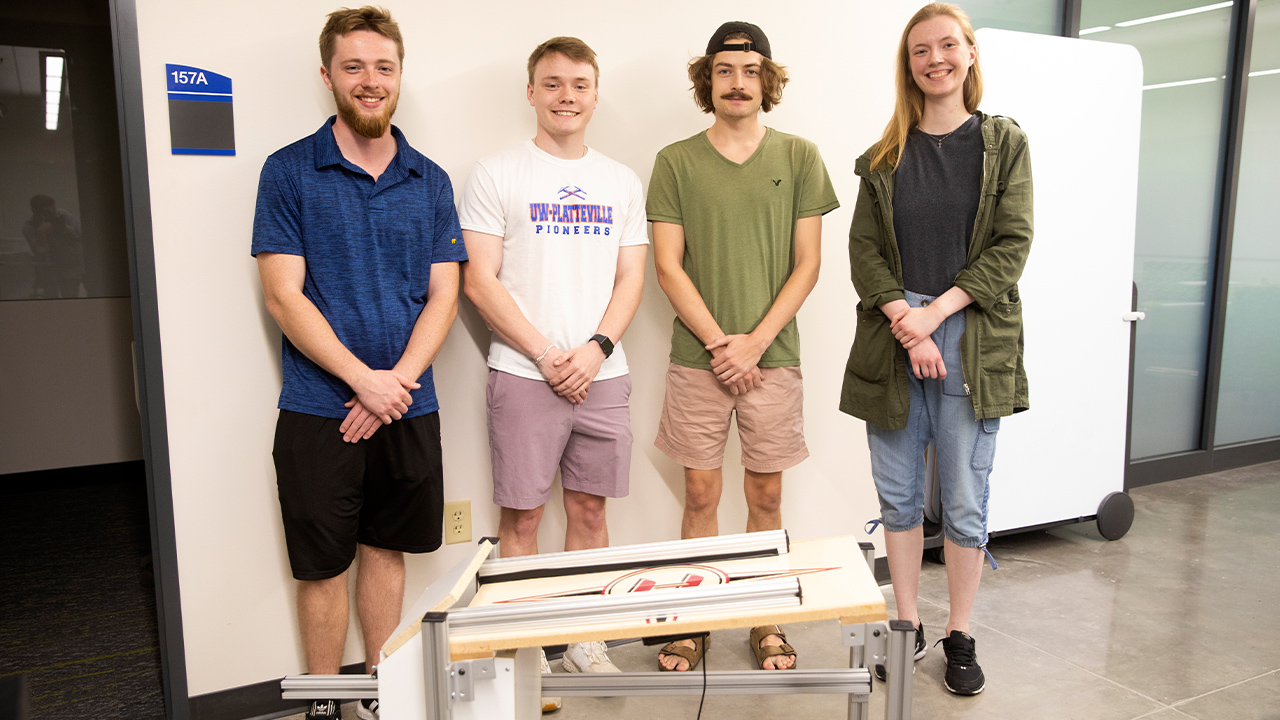 Team members worked with L.E. Phillips Career Development Center to design an automated diaper tab stacker. Pictured from left to right are Matthew Fauser, Ryan Nottestad, Jack Hutchinson and Bethany Rozof.