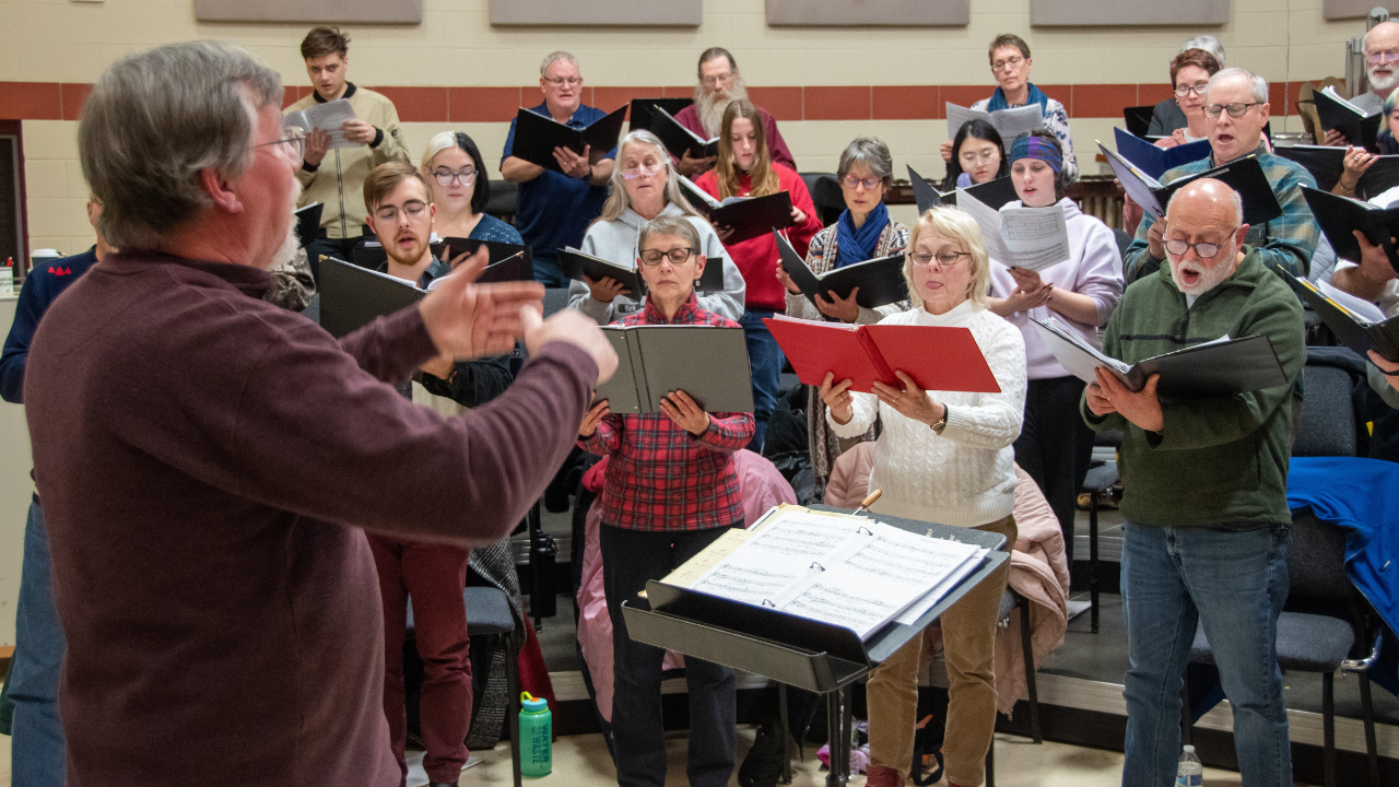Campus/Community Choir of the University of Wisconsin-Platteville Baraboo Sauk County practices for the “Songs of the Season” concert