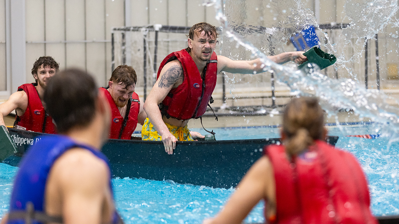 Students engaged in a Battleship competition, organized by the HHP club to raise funds for the Dr. Scott Ringgenberg Memorial Scholarship.