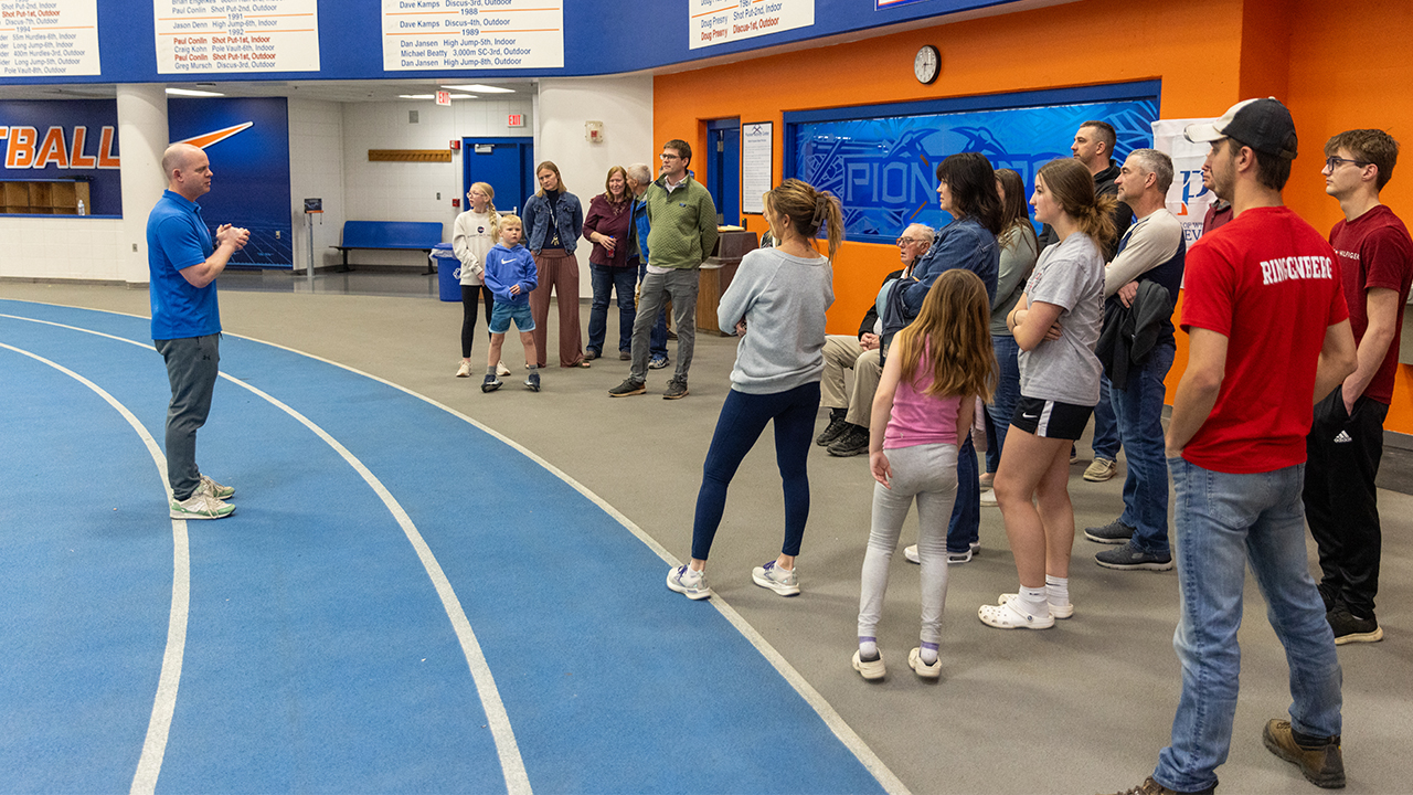 Tim Swenson, assistant professor of health and human performance, speaks at the dedication ceremony.