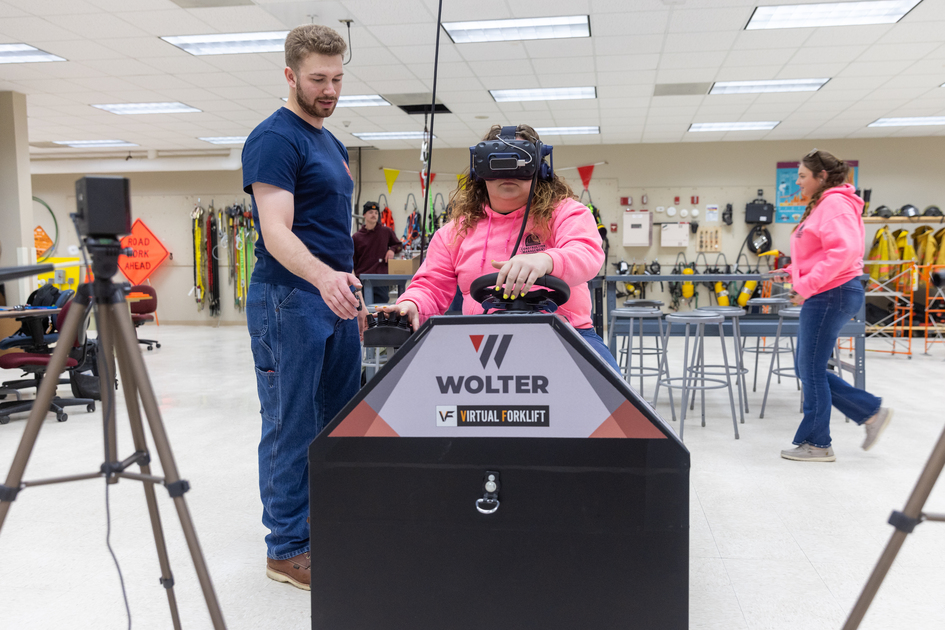 A student working with the virtual reality heavy equipment simulator in the Safety Lab.