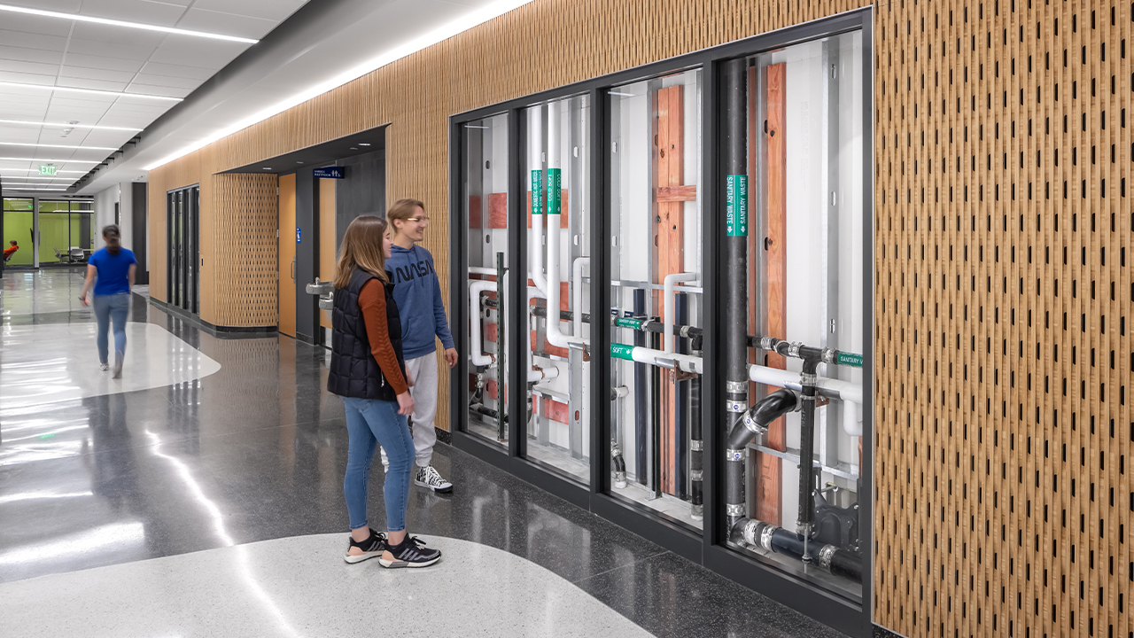 Sesquicentennial Hall showcases its engineering features, embodying the concept of 'Building as a Learning Tool.'