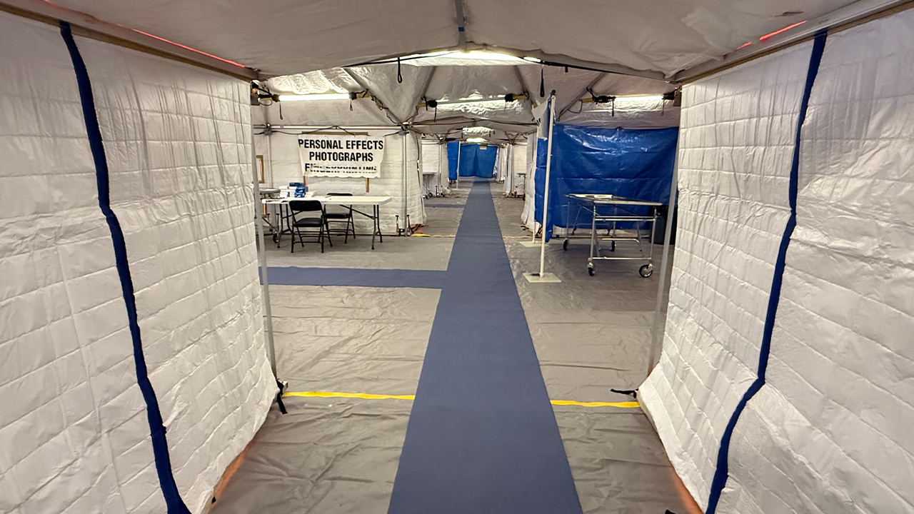 There were several stations including DNA sampling, fingerprinting, dental record tracing and X-raying.