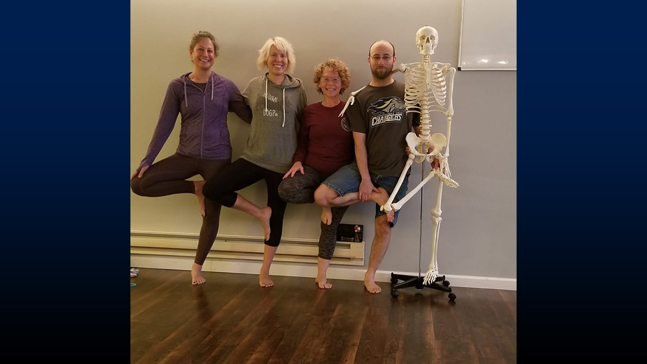 From left to right at Rooted Studio in Platteville, owned by Pitcher and his wife Tina Disch: Nadia Sifri, Danielle Carlson, Tina Disch, Thomas Pitcher, and Mr. Bones.