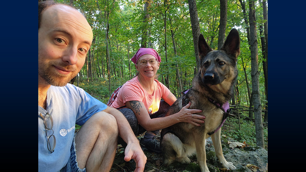 Pitcher enjoying the trails in Platteville with wife, Tina Disch, and their dog, Korah.