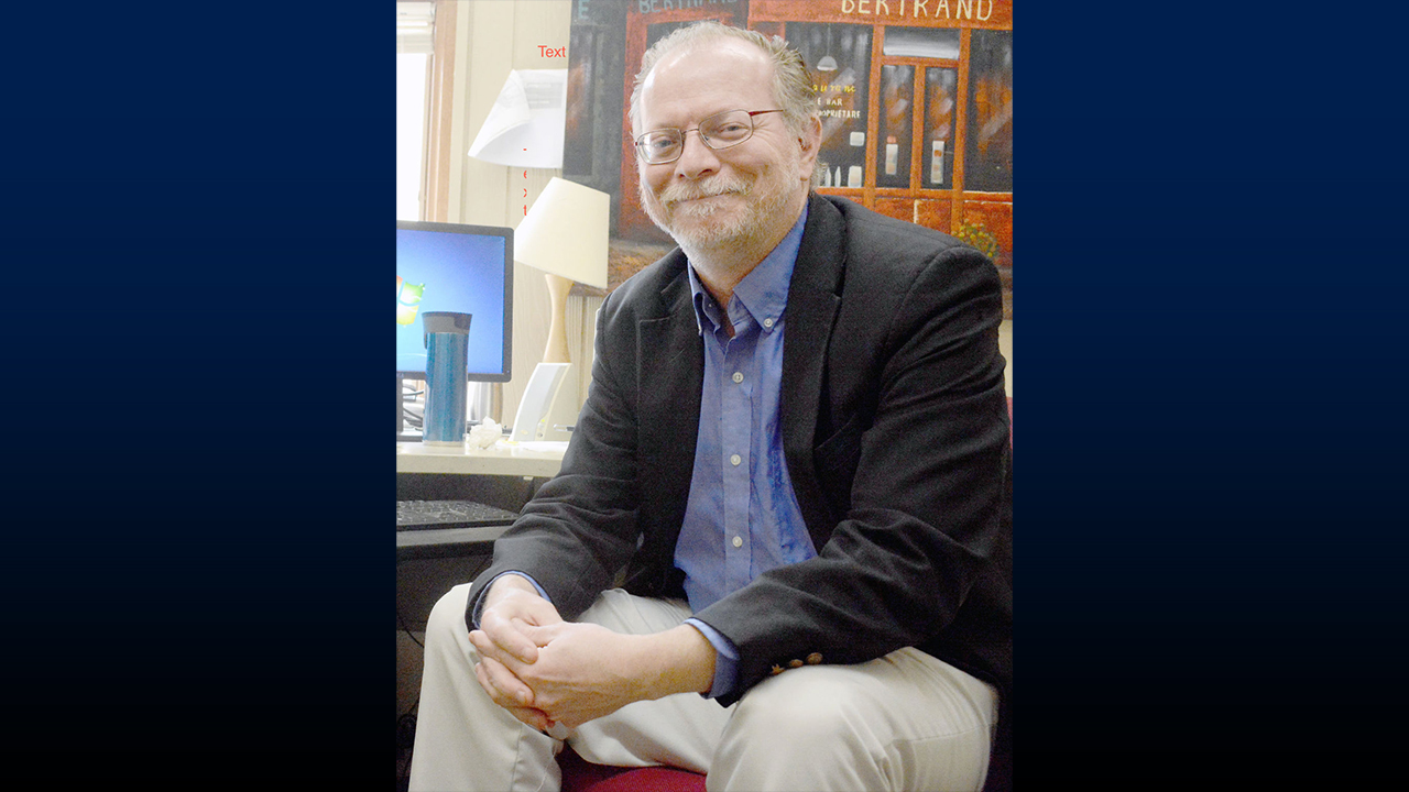 "It’s the sense of a shared mission to help provide a student-centered, liberal arts education, and an esprit de corps with my colleagues in trying our best to accomplish that endeavor," says Murray, reflecting on the collaborative spirit that drives his work.