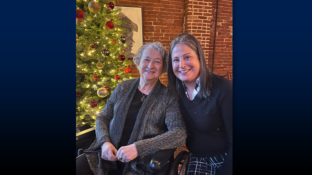 Sifri and her mother, Cindy, celebrating her father’s 80th birthday at a special dinner in Quincy, IL.