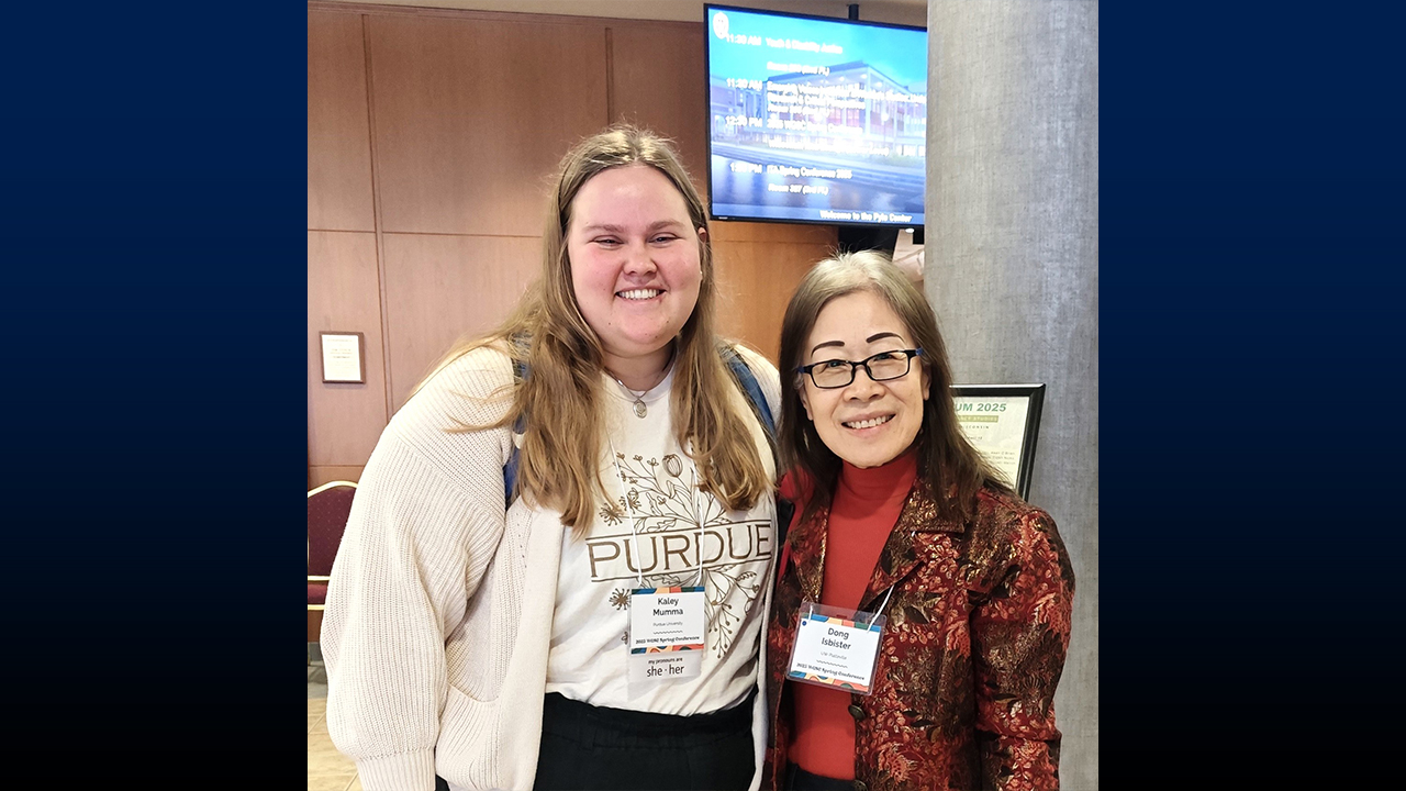 Isbister pictured with her former student Kaley Mumma, now a doctoral student at Purdue University, at the 2025 WGSC Spring Conference.