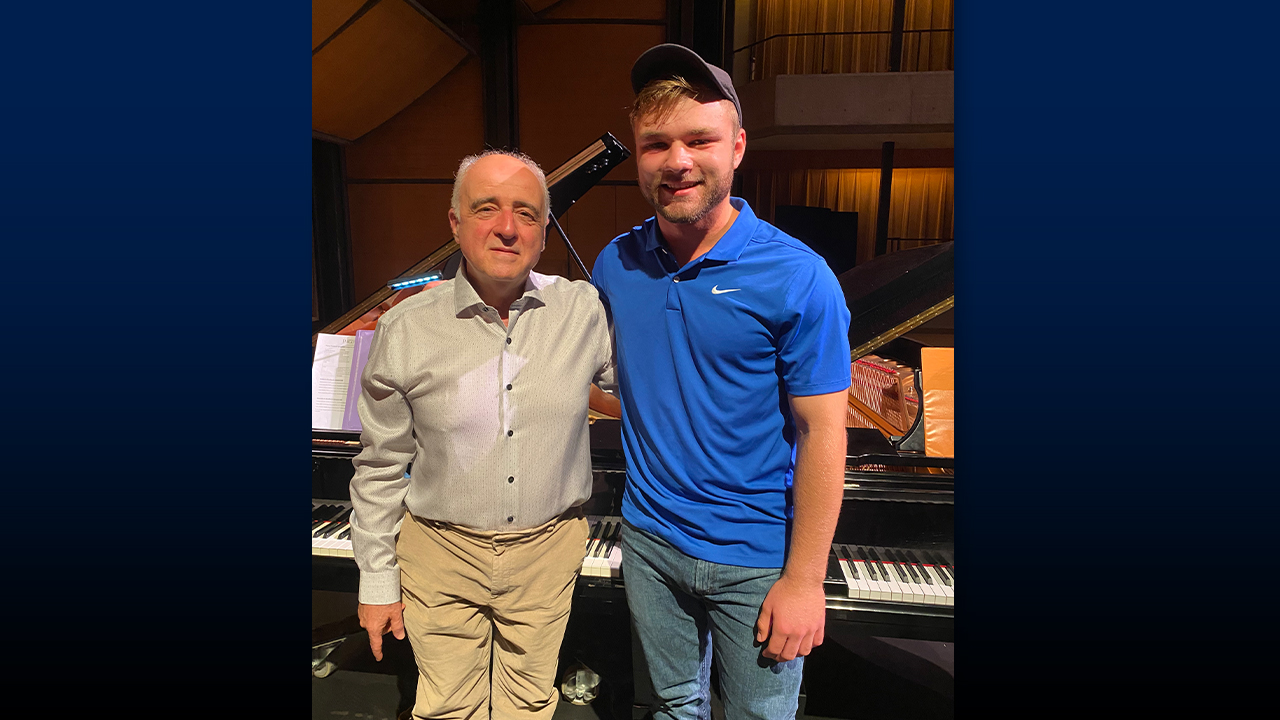 Ethan Squires with Canadian pianist and professor Gregory Chaverdian following a master class.