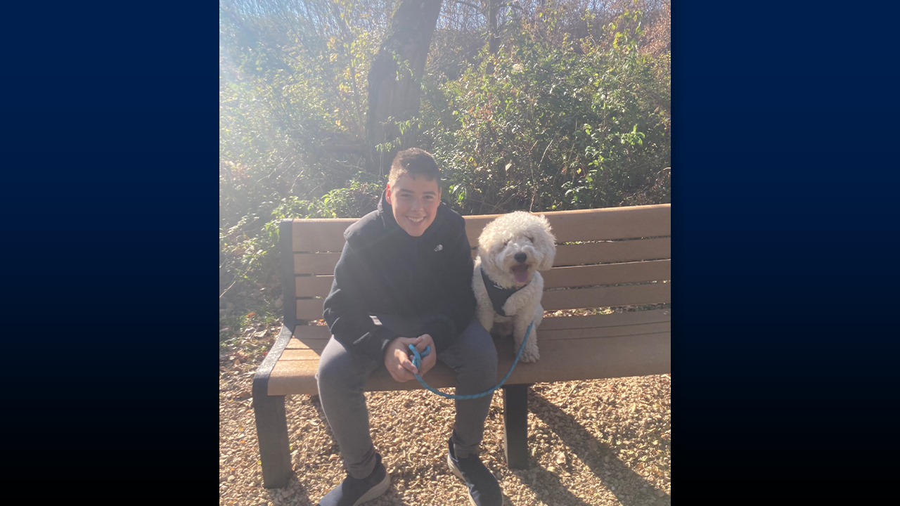 Luka and Loki on the city bike trail during a family walk.