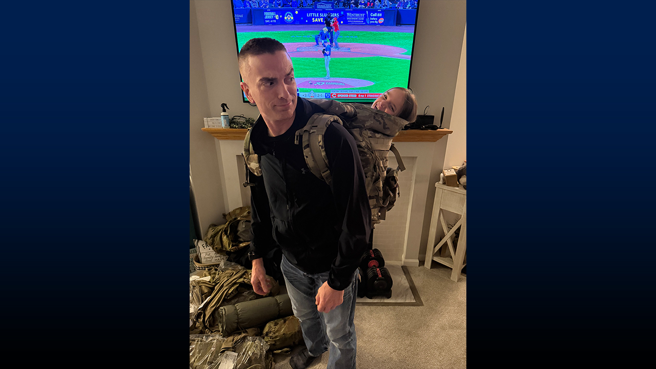 "I was packing for the field when my youngest daughter hopped into my rucksack, insisting that I couldn’t leave without her,”laughed Anderson. “So, I put it on and said, ‘Let’s go!’"