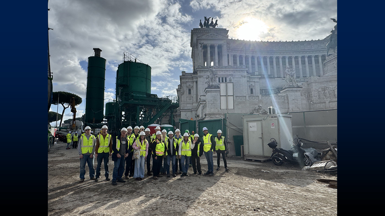 Group photo at a construction site. 