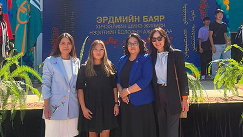 Agiimaa Kerwin poses in a group photo with her co-teachers during opening ceremonies at the Erdenet Institute of Technology in Erdenet, Mongolia, on Sept. 1, 2026. From left to right: Jivaa Dashdondog, Kerwin, Oyuntuya Ishdorj, Selenge Nergui.