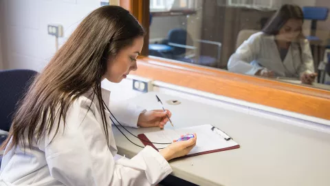 Dominique Kornely conducting research at UW-Platteville in 2018.