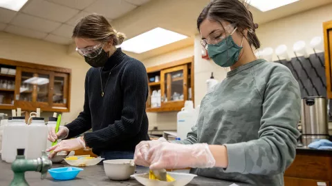 Jenna Springer and Victoria Chanez working in lab