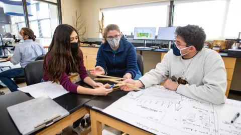 Pictured left to right are S. Blossom Ramos, Grace Trenkamp and John Rodwell.