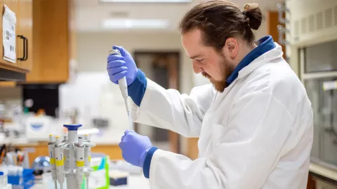 Garrett Larsen working in the lab