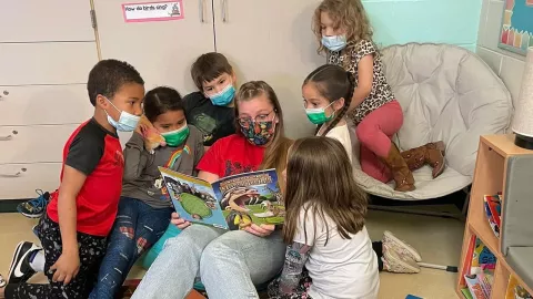 Jillian Meister reading to students