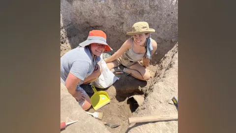 Becca Bartusewich (left), advising manager for the Office of Professional Program Support, participated in an archaeological dig. 
