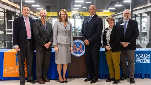 Signing ceremony with Madison College in Sesquicentennial Hall