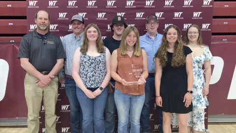 Pictured L-R: Dr. Chris Baxter (coach), Brock Stringfield, Emily Lovett, Jake Scheckel, Alia Meiners, Luke Van Donsel, Emily Lovett, Andrea Noll
