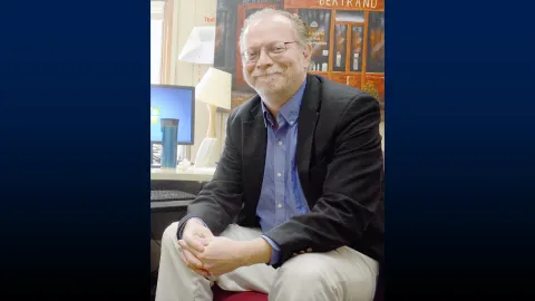 "It’s the sense of a shared mission to help provide a student-centered, liberal arts education, and an esprit de corps with my colleagues in trying our best to accomplish that endeavor," says Murray, reflecting on the collaborative spirit that drives his work.