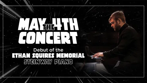 Man in black suit sitting at a Steinway grand piano, with wording that reads May the 4th Concert, Debut of the Ethan Squires Memorial Steinway Piano